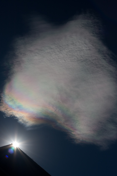 A rainbow seen in the clouds